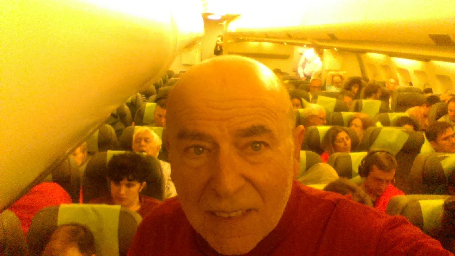 Juan Xuna taking a selfie on a plane