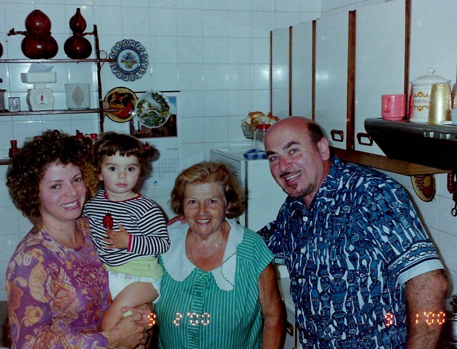 Family in a kitchen in Spain, February 2000
